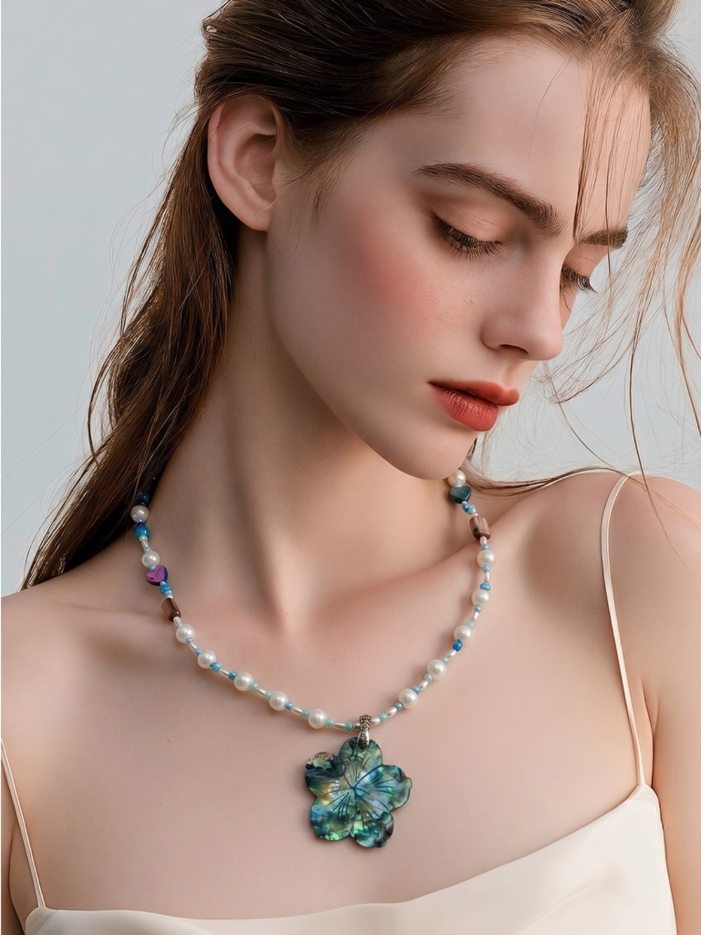 28” Beaded Necklace With Iridescent Floral Abalone Pendant